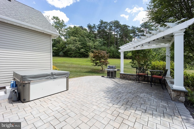 view of patio featuring a pergola and a grill