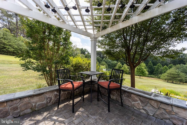 view of patio featuring a pergola