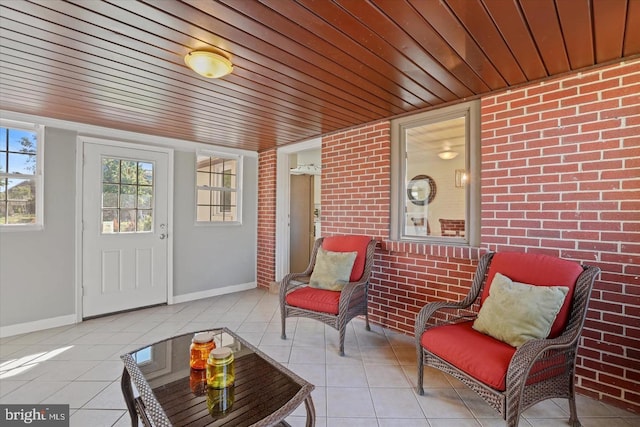 sunroom / solarium with wood ceiling