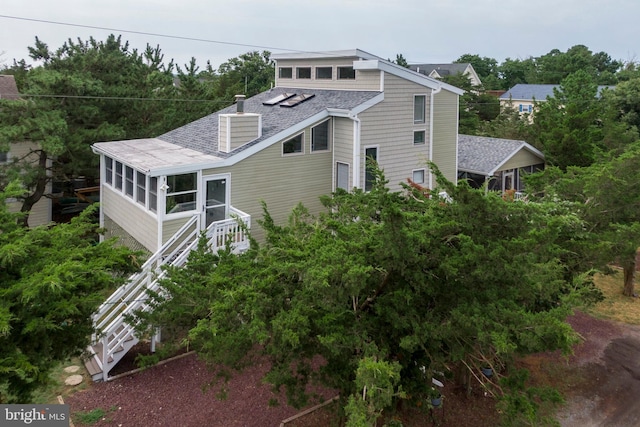 exterior space with a sunroom