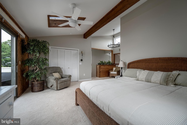 bedroom with a closet, light carpet, lofted ceiling with beams, and ceiling fan with notable chandelier