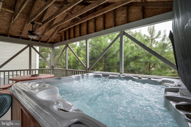 view of pool with a hot tub and ceiling fan