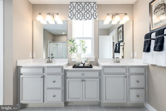 bathroom featuring walk in shower and vanity