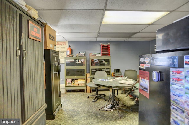 home office featuring a paneled ceiling