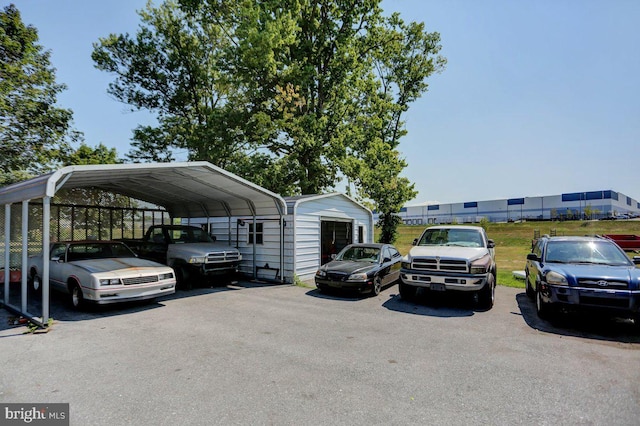 view of parking featuring a carport