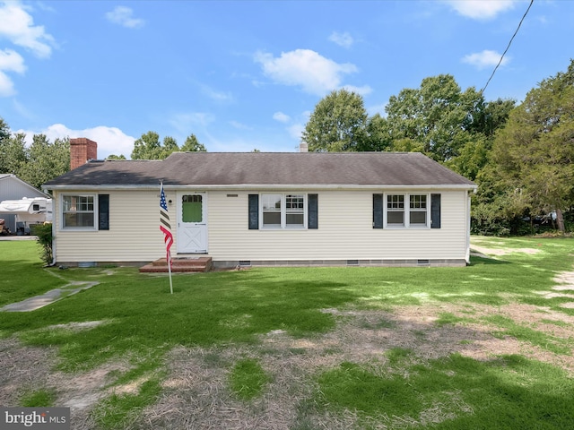 view of front facade with a front lawn