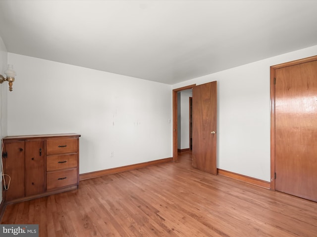 unfurnished bedroom with light hardwood / wood-style flooring