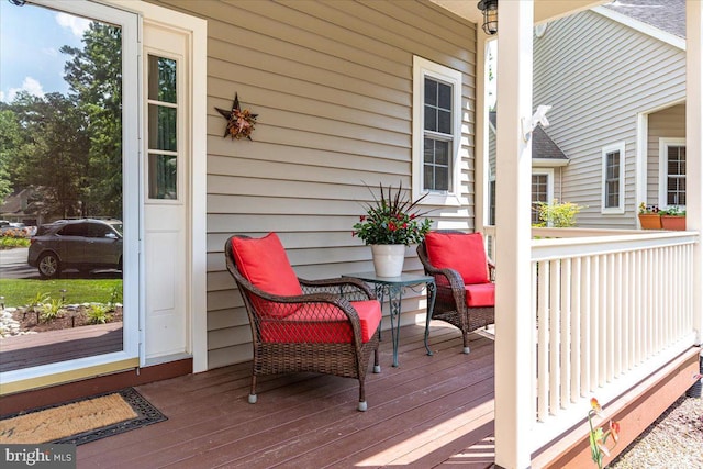 deck featuring covered porch