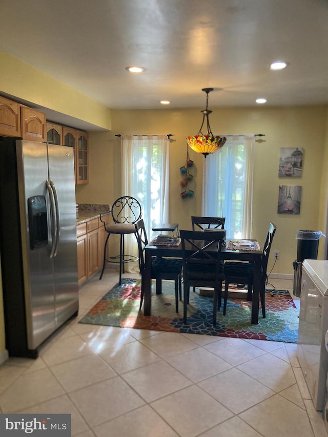 view of tiled dining space