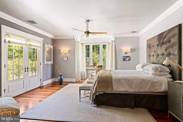 bedroom with access to exterior, wood-type flooring, ceiling fan, french doors, and ornamental molding