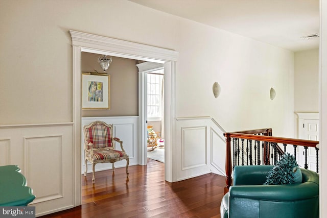 sitting room with hardwood / wood-style floors