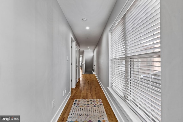 hall featuring dark wood-type flooring