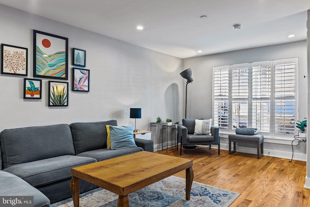 living room with light hardwood / wood-style floors