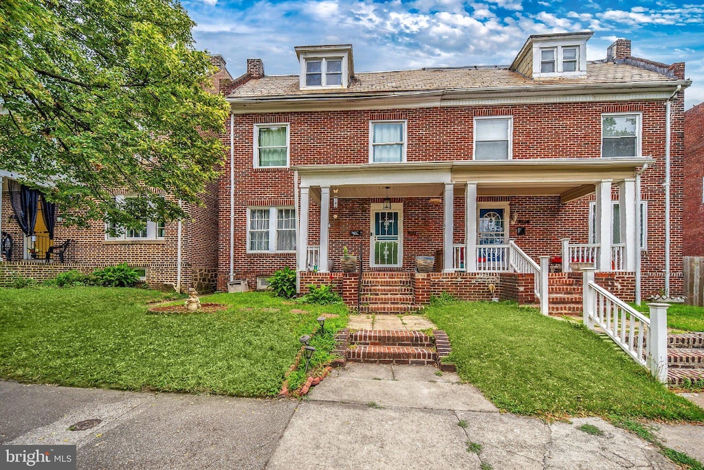 view of front of home featuring covered porch