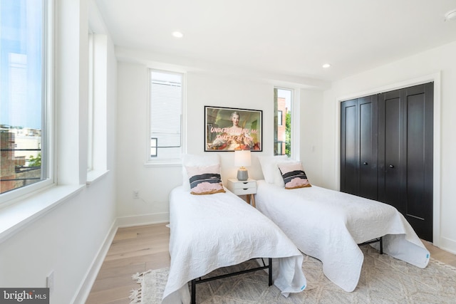 bedroom featuring light hardwood / wood-style floors