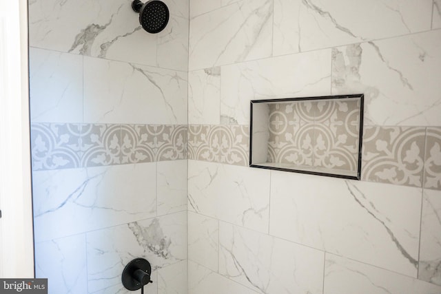 details with a tile shower