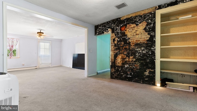 unfurnished living room featuring a baseboard radiator, a textured ceiling, and carpet