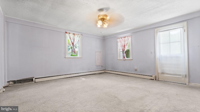 spare room featuring a textured ceiling