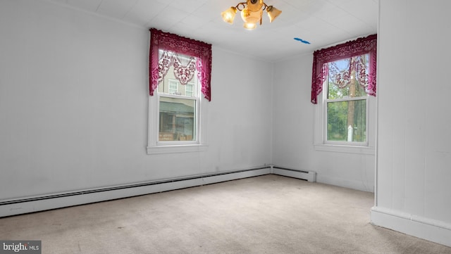 unfurnished room with a baseboard radiator, ornamental molding, and light carpet