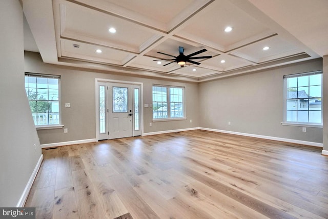 entrance foyer with beamed ceiling, ceiling fan, light wood-type flooring, and coffered ceiling