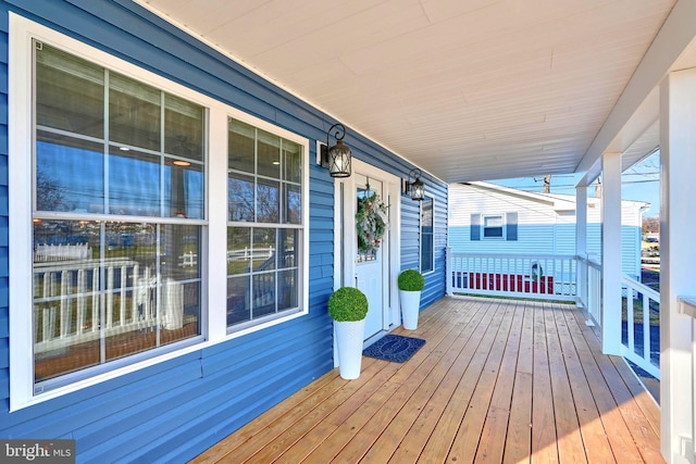 wooden deck with covered porch