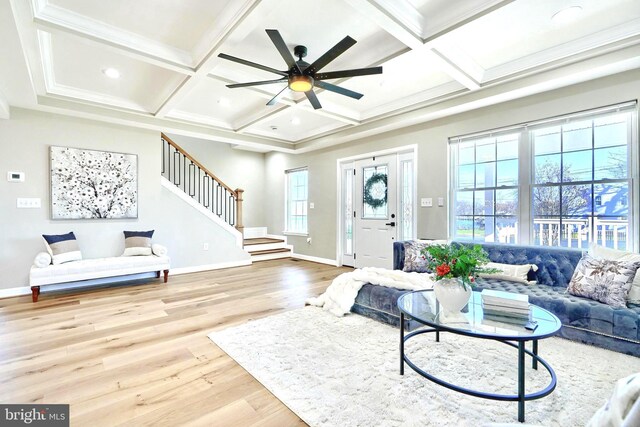 kitchen with a chandelier, white cabinetry, light stone countertops, and appliances with stainless steel finishes