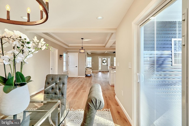 interior space featuring beamed ceiling and light wood-type flooring