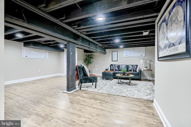 basement featuring wood-type flooring