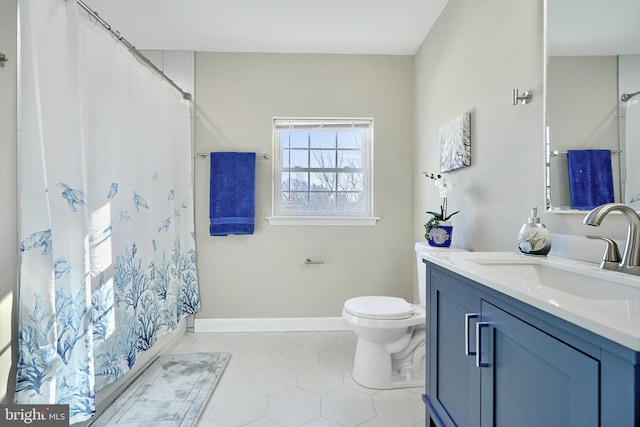 bathroom featuring tile patterned flooring, vanity, toilet, and a shower with shower curtain