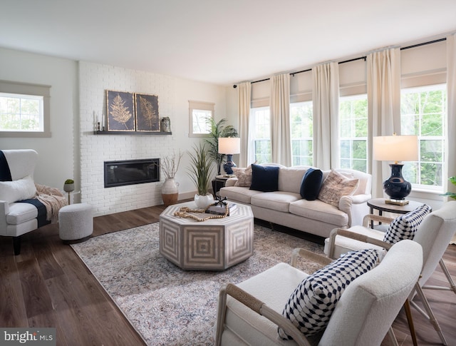 living room featuring hardwood / wood-style floors and a fireplace