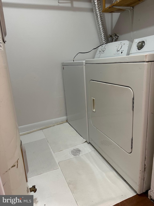 laundry room featuring separate washer and dryer