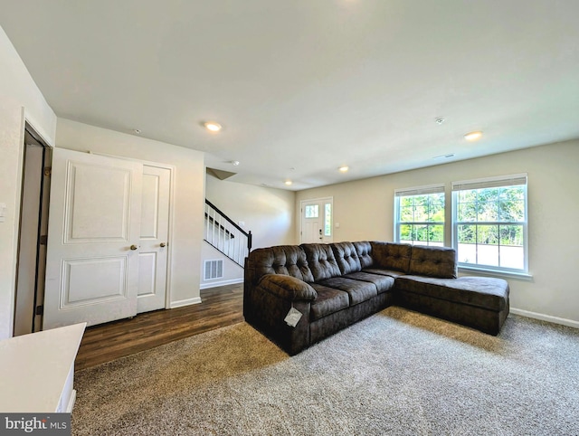 living room with dark wood-type flooring