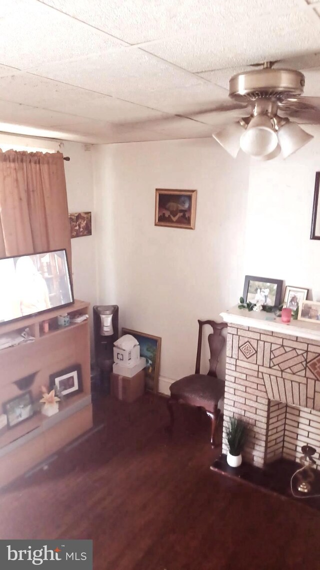 miscellaneous room with ceiling fan and hardwood / wood-style floors