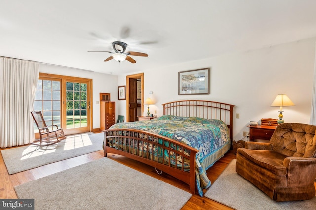 bedroom with access to exterior, ceiling fan, and light hardwood / wood-style flooring