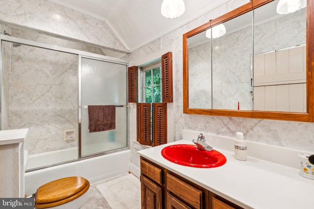 full bathroom featuring combined bath / shower with glass door, vanity, ornamental molding, vaulted ceiling, and toilet