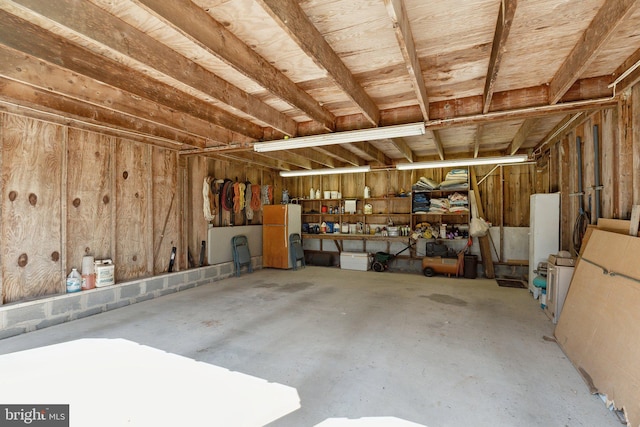 garage featuring fridge