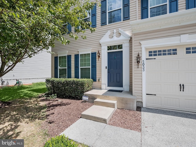 entrance to property with a garage