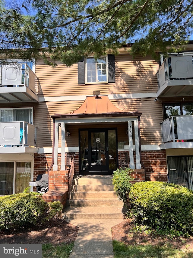 view of exterior entry with french doors