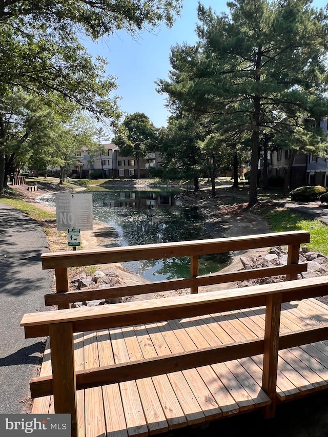 4300 Buckman Rd Unit H, Alexandria, VA 22309 - wooden terrace featuring a water view