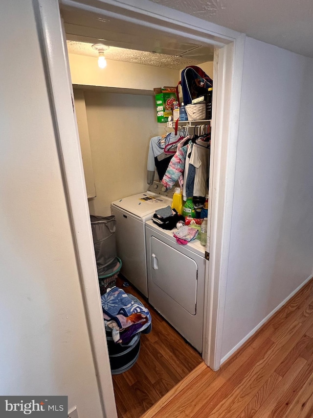 4300 Buckman Rd Unit H, Alexandria, VA 22309 - laundry area featuring light wood-style floors and independent washer and dryer