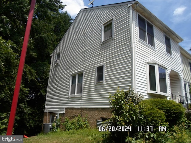 view of home's exterior featuring central air condition unit