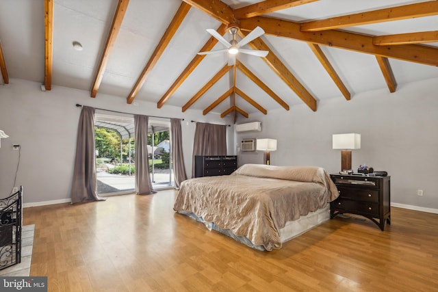 bedroom with vaulted ceiling with beams, baseboards, access to exterior, a wall mounted AC, and light wood finished floors