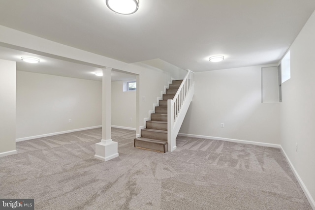 basement with carpet flooring