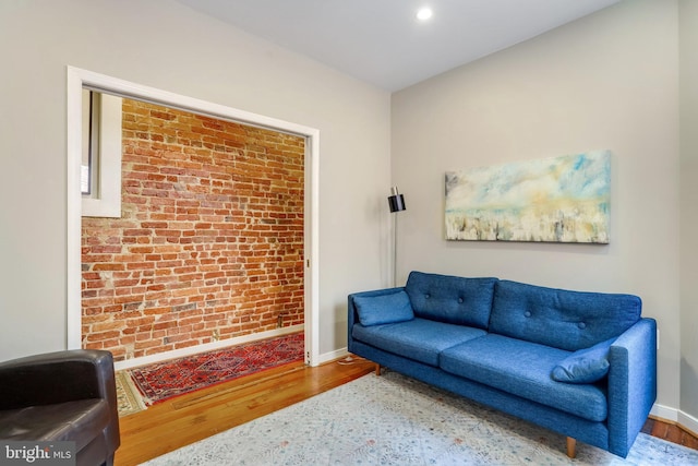 sitting room featuring hardwood / wood-style floors