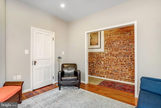 living area with wood-type flooring