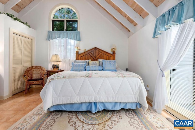 tiled bedroom featuring high vaulted ceiling, wooden ceiling, and beamed ceiling