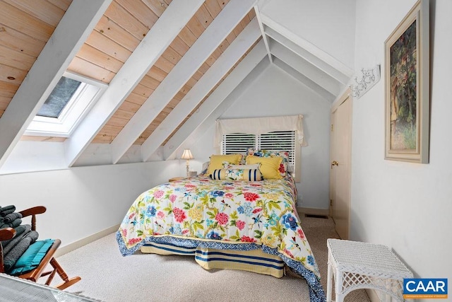 carpeted bedroom with lofted ceiling with skylight and wooden ceiling