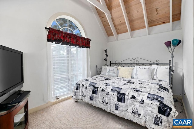 carpeted bedroom with high vaulted ceiling, wooden ceiling, and beam ceiling