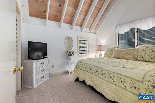 carpeted bedroom featuring vaulted ceiling with beams and wooden ceiling