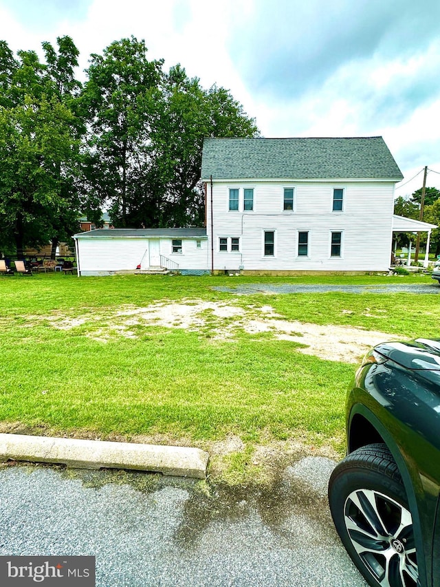 exterior space with a front lawn